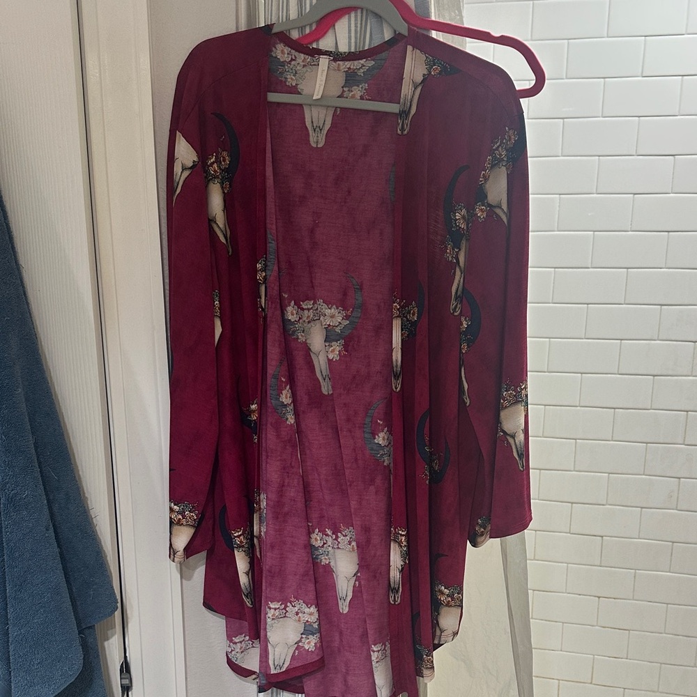 Elegant Burgundy Cardigan with Floral Skull Design